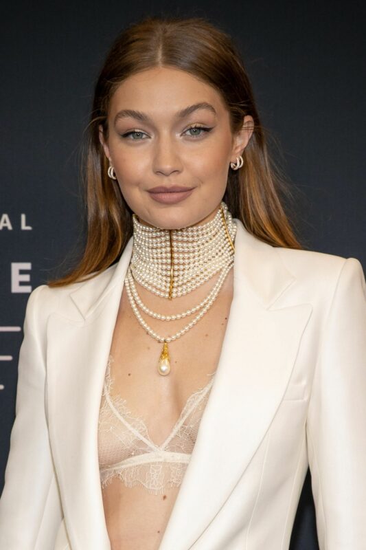 Fabulous Gigi Hadid in a White Versace Blazer at Rihanna’s Savage X Fenty Fashion Show 2021