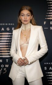 Fabulous Gigi Hadid in a White Versace Blazer at Rihanna's Savage X Fenty Fashion Show 2021