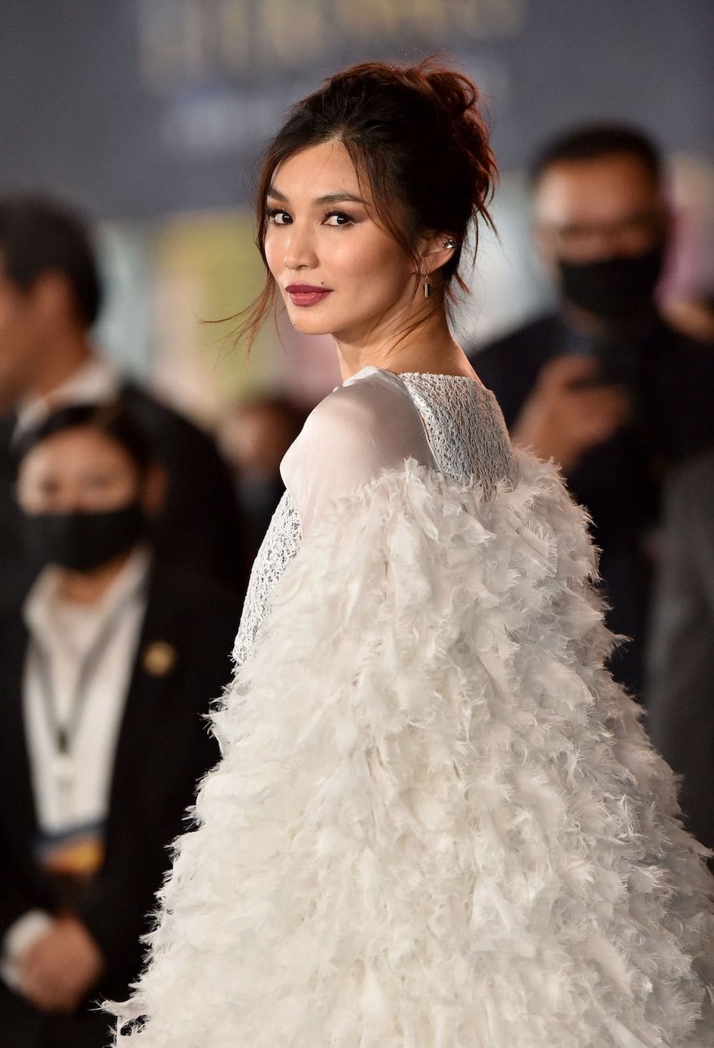 gemma chan looks pretty in louis vuitton gown at the eternals la premiere october 2021