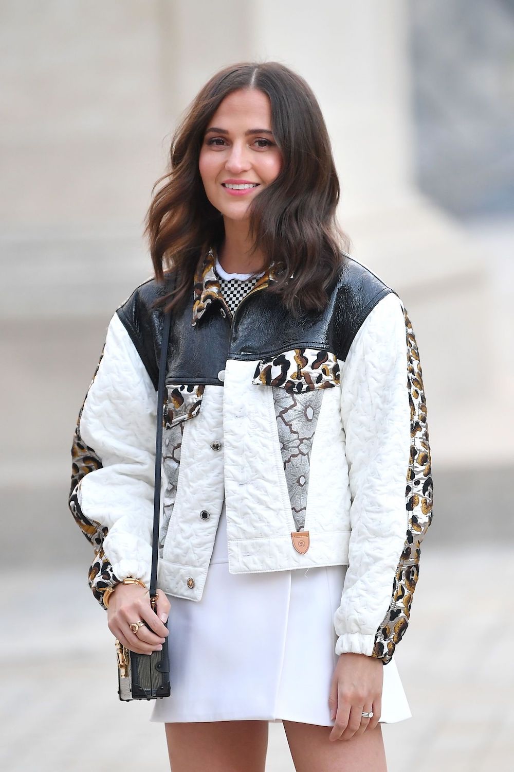 Alicia Vikander attended the star studded Louis Vuitton Spring Summer 2022 show during Paris Fashion Week with Ana De Armas on October 5, 2021.