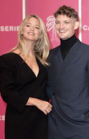 Virginie Efira and Niels Schneider pose on the red carpet during the day 2 of 4th edition of the Cannes International Series Festival (Canneseries) held in Cannes on October 9, 2021.