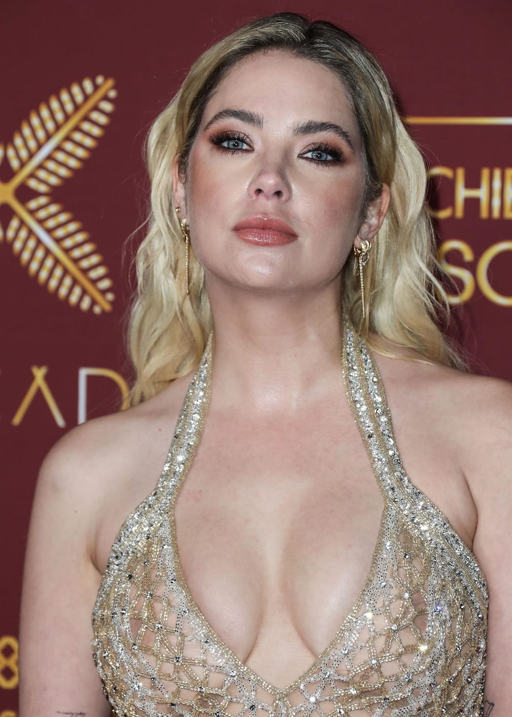 Sexy Ashley Benson in Gold Mini Dress at 2022 Pre-Oscars Party in LA