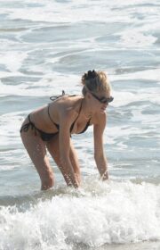 Charlotte McKinney Stunning in Busty Black Bikini at Santa Monica Beach 2022