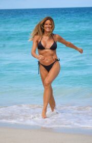 Remarkable Kelly Bensimon in Black SKIMS Bikini at Miami Beach 2022