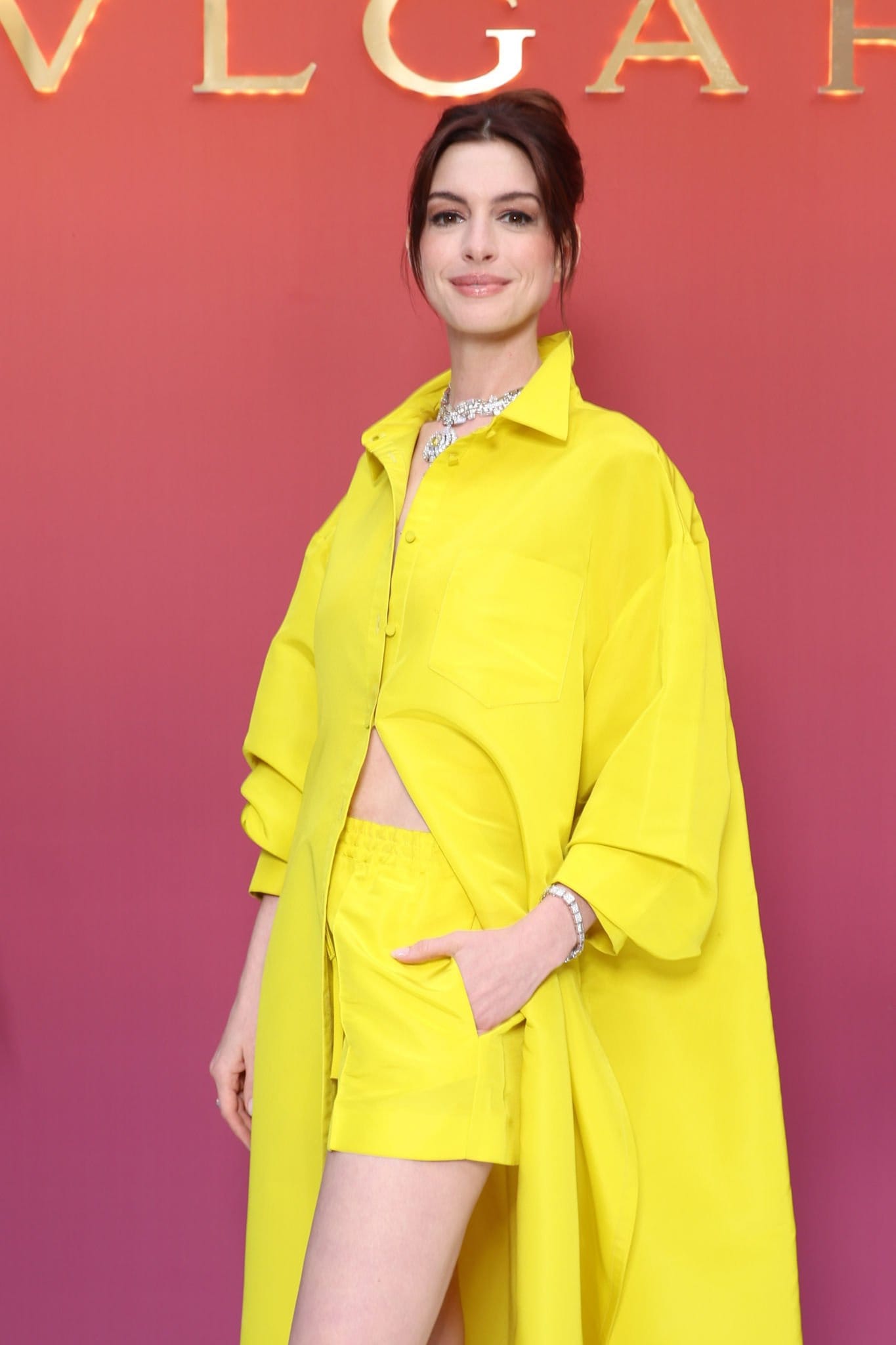 Gorgeous Anne Hathaway in Yellow Valention Shorts at Bvlgari High Jewelry Gala 2022