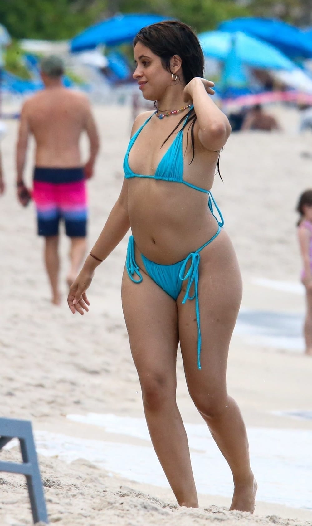 Camila Cabello looked incredible in a tiny string bikini as she had a fun b...