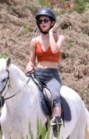 Emma Watson in Orange Bralette Enjoys Horseback Riding in Ibiza 2022