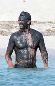 Nicole Scherzinger in Bikini Enjoys a Mud Bath with Her Boyfriend in Spain 2022