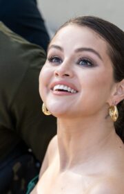 Radiant Selena Gomez in Green Midi Dress Arrives to Jimmy Kimmel Live 2022