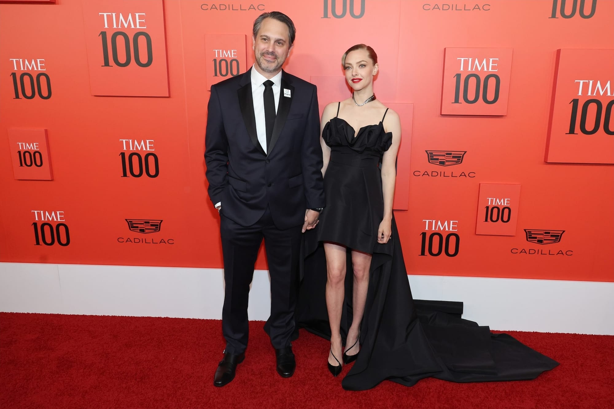 Amanda Seyfried and her husband Thomas Sadoski on the red carpet for the 2022 Time 100 Gala at the Lincoln Center in New York City.