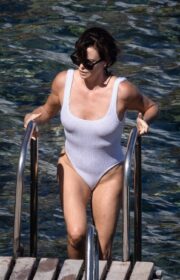 Charlize Theron in a White Swimsuit in Tuscany Italy 2022