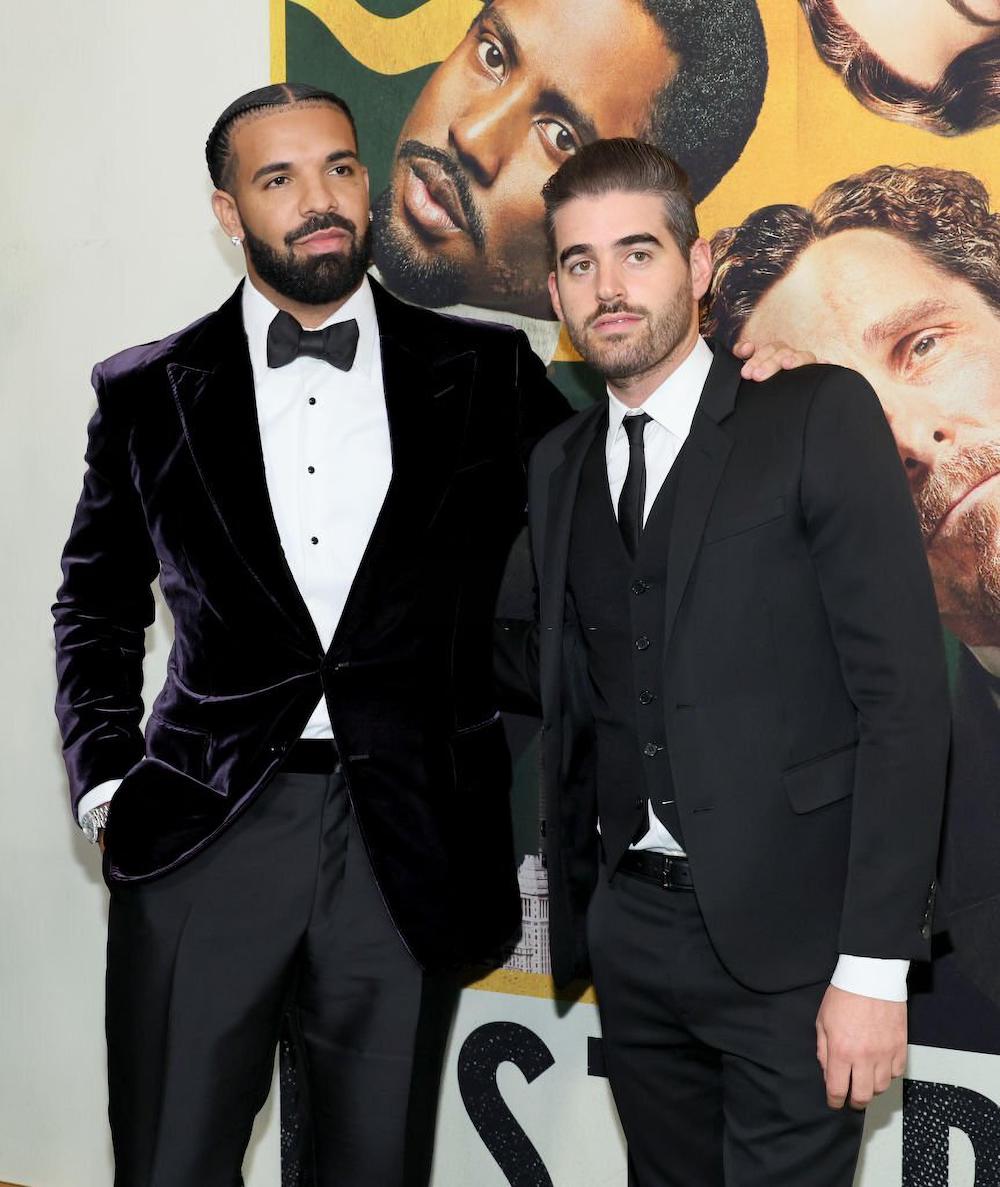  Drake with actor Matthew Budman at the premiere.