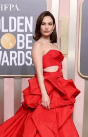 Fabulous Lily James in Atelier Versace Gown at 2023 Golden Globes Awards