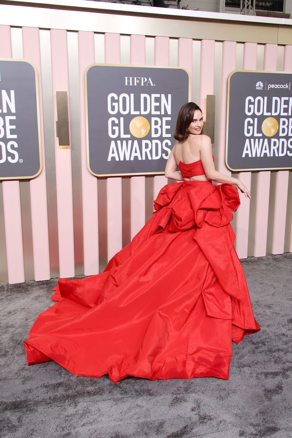 Fabulous Lily James in Atelier Versace Gown at 2023 Golden Globes Awards