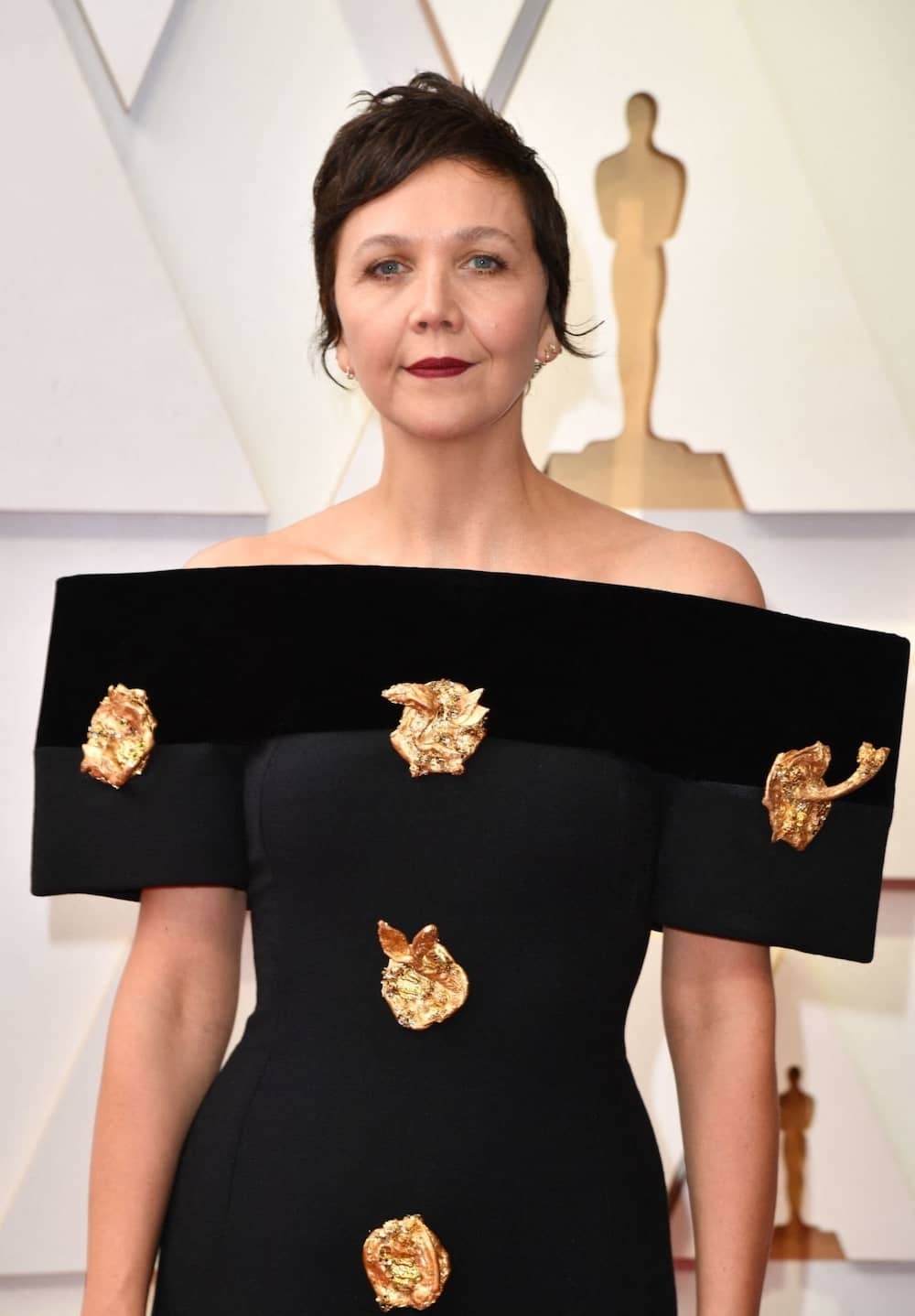 Oscars 2022: Maggie Gyllenhaal in Gold Accent Schiaparelli with Husband