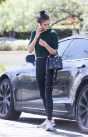 Nina Dobrev in a Top Knot Bun Hairstyle Leaving the Gym in Los Angeles