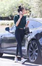 Nina Dobrev in a Top Knot Bun Hairstyle Leaving the Gym in Los Angeles